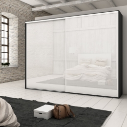 Sistema a scorrimento inferiore per armadi con chiusura soft